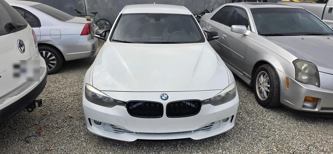White BMW 328i photographed from above at the front before engine replacement - Temecula, CA