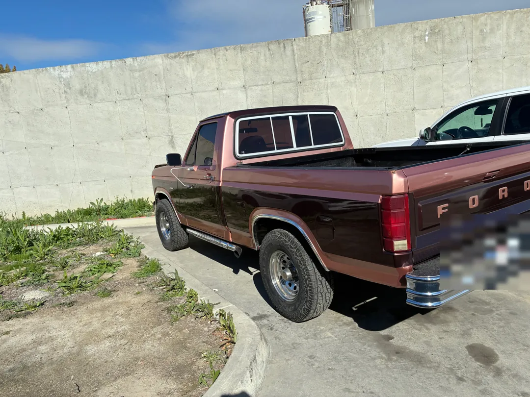 80s Ford F-Series pickup parked on a driveway waiting for an engine and transmission swap - Lake Elsinore, CA