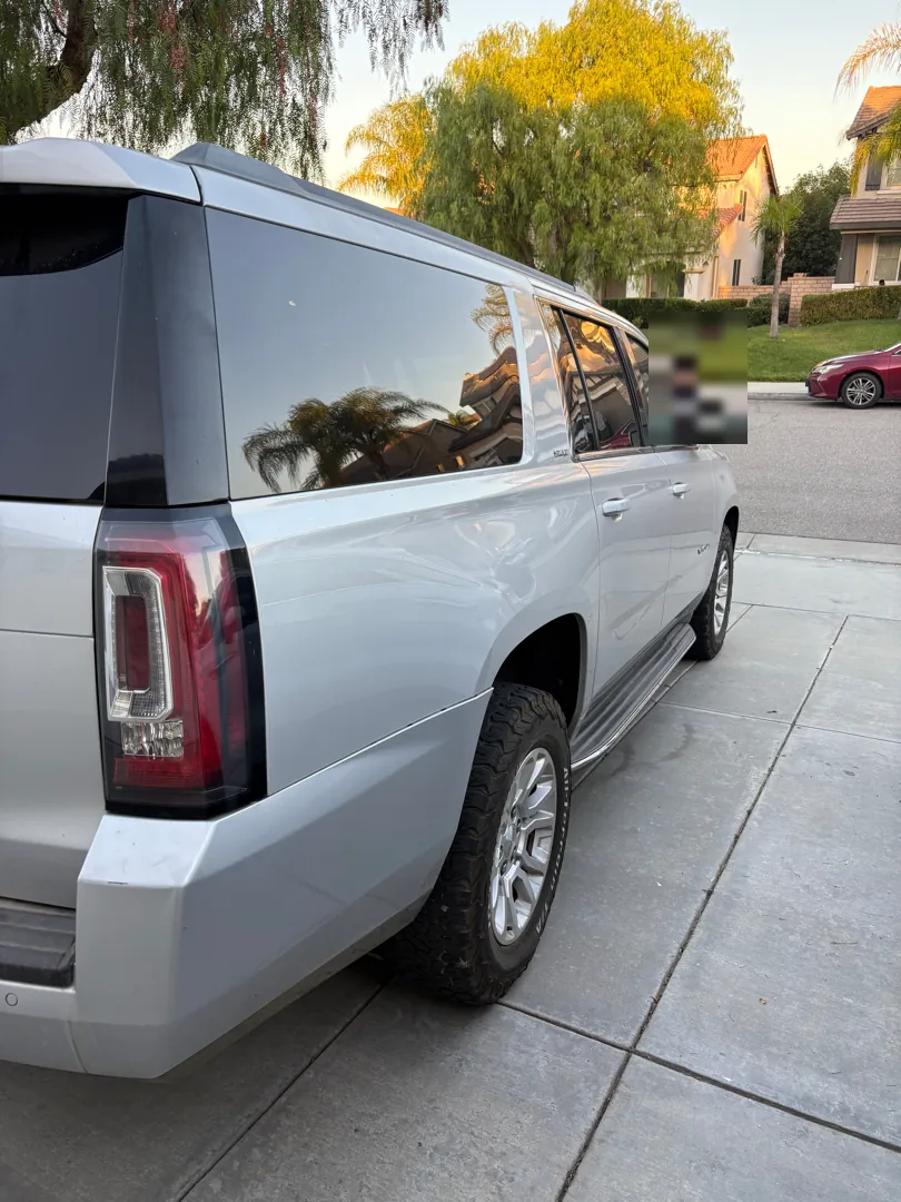 2015 GMC Yukon XL parked in a residential driveway during a mobile diagnostic - Menifee, CA