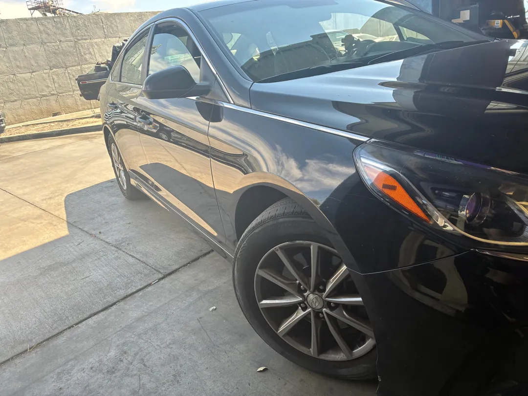 Black Hyundai Sonata parked at a repair shop during a drivability diagnostic - Murrieta, CA