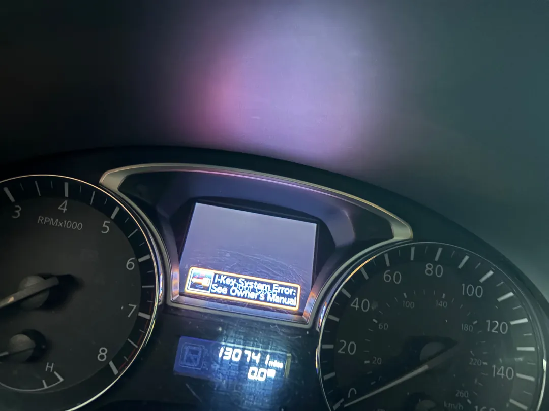 Nissan instrument cluster displaying a Key System Error message - Perris, CA