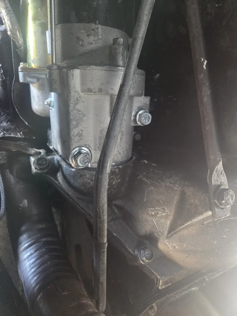 Newly installed starter motor bolted to an engine block - Temecula, CA