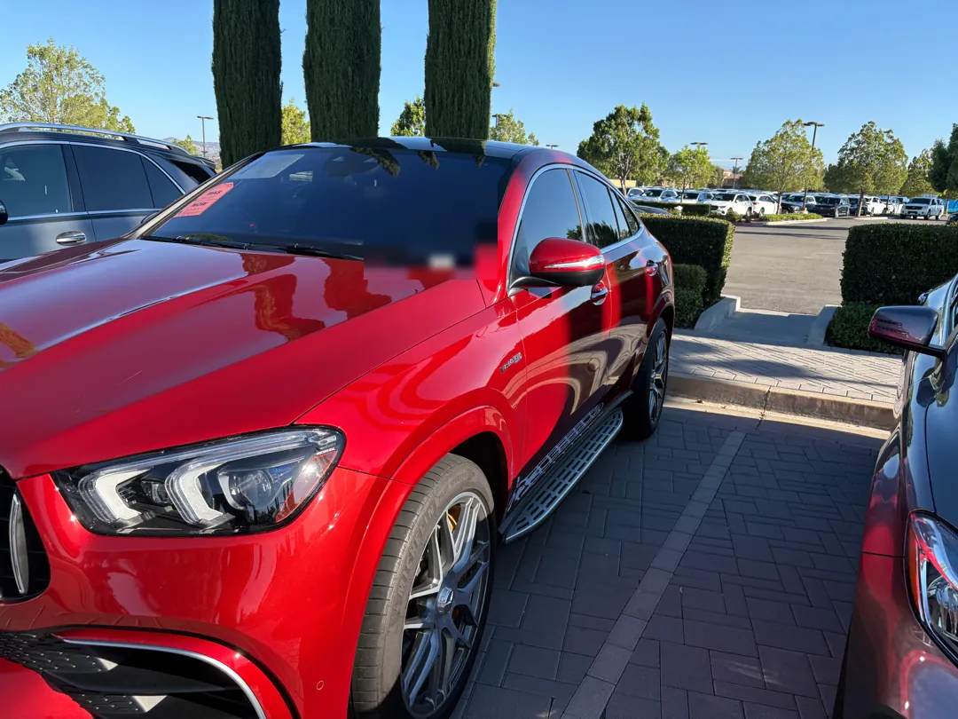 Side profile of a red Mercedes-AMG GLE coupe during a pre-purchase inspection - Temecula, CA