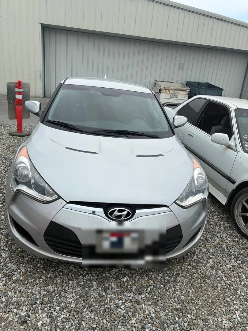 Silver 2012 Hyundai Veloster front three-quarter view before a diagnostic - Menifee, CA