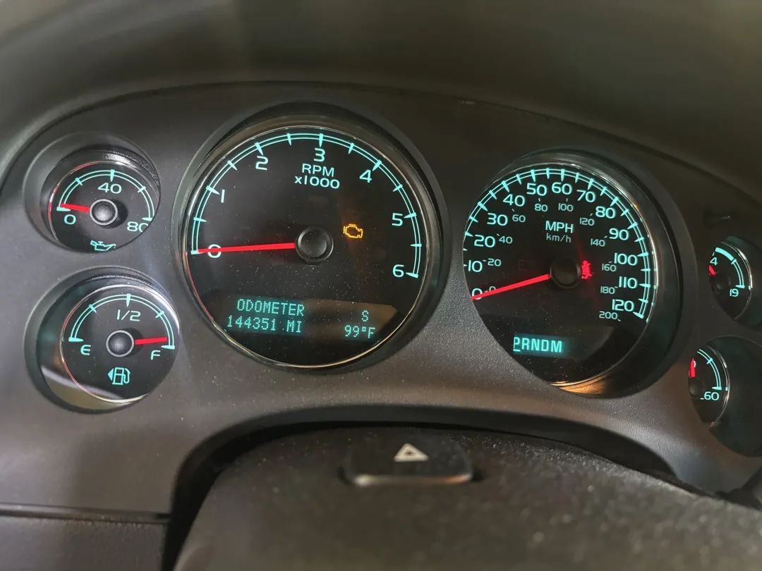 Instrument cluster of a GMC Yukon Denali reading 144,351 miles - Menifee, CA