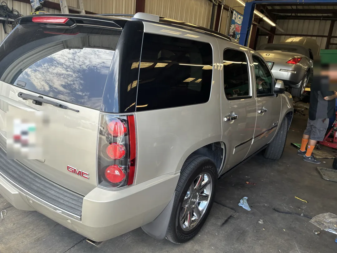 GMC Yukon Denali in a repair bay during an evaporative system smoke test - Menifee, CA